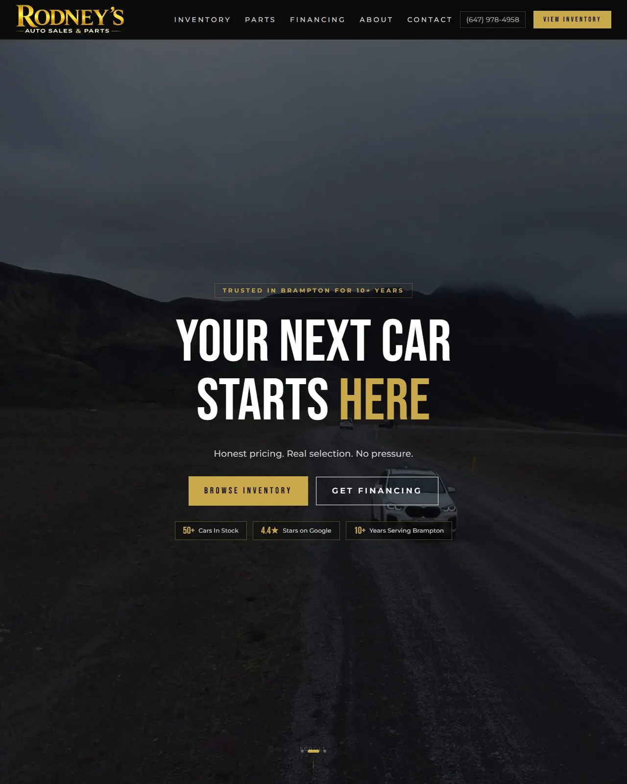 Rodney's Auto Sales homepage with the headline Your next car starts here over a mountain road